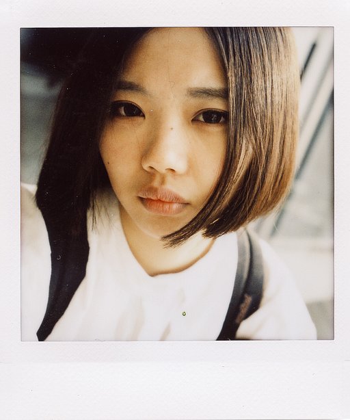 What are some features of Lomography Instant cameras?